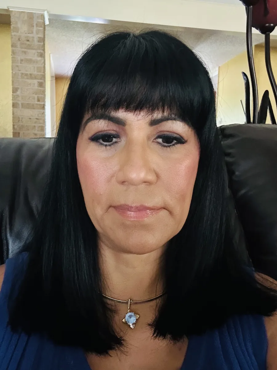 Keratin smoothing treatment with a precision haircut: glassy black lob with blunt bangs by Richie at Damron & Company Salon in Austin